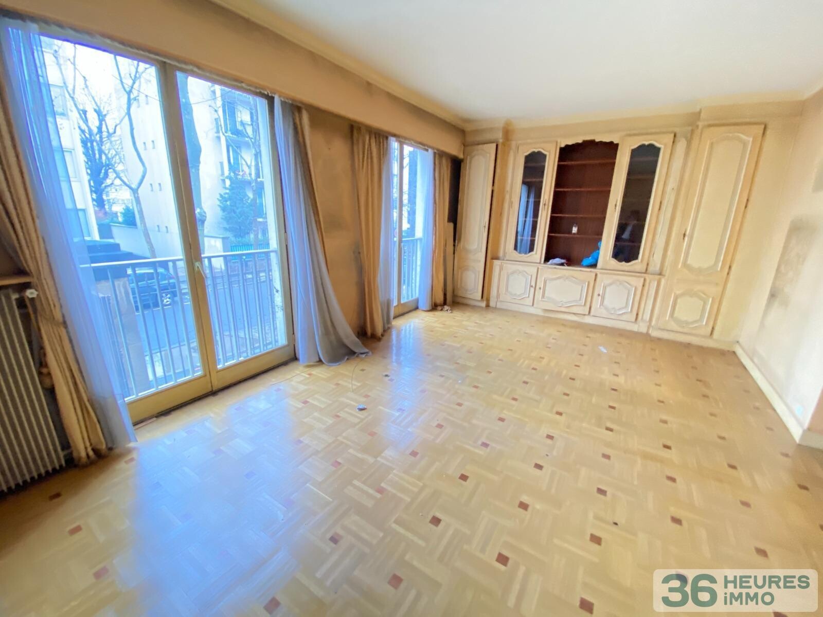 Grand T3-T4 de 74m2 + balcon + parking + cave