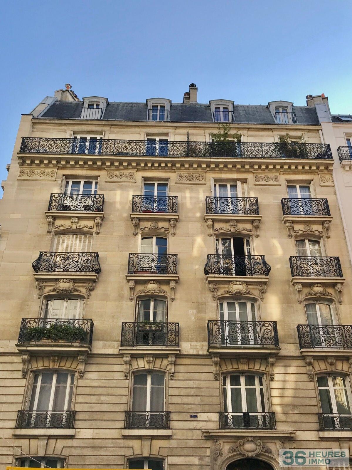 APPARTEMENT DE TYPE 4 PIECES DANS IMMEUBLE PIERRE DE TAILLE