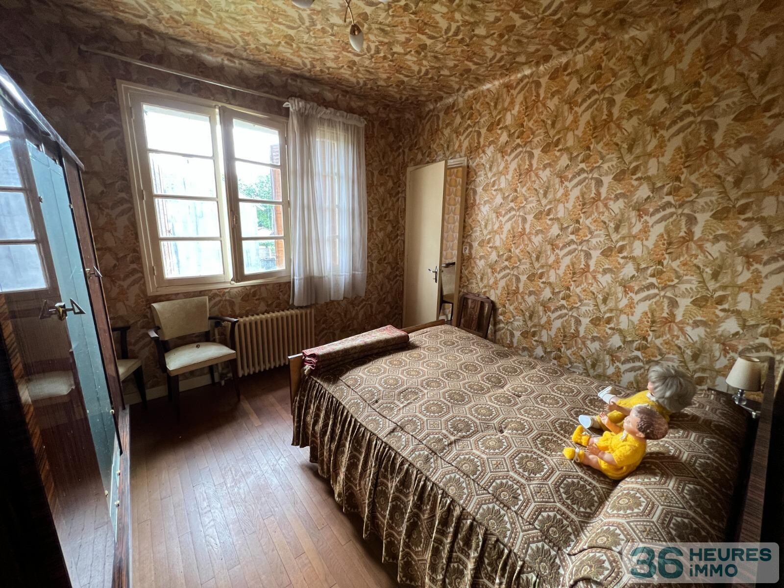 Ensemble de deux maisons sur un grand terrain arbore