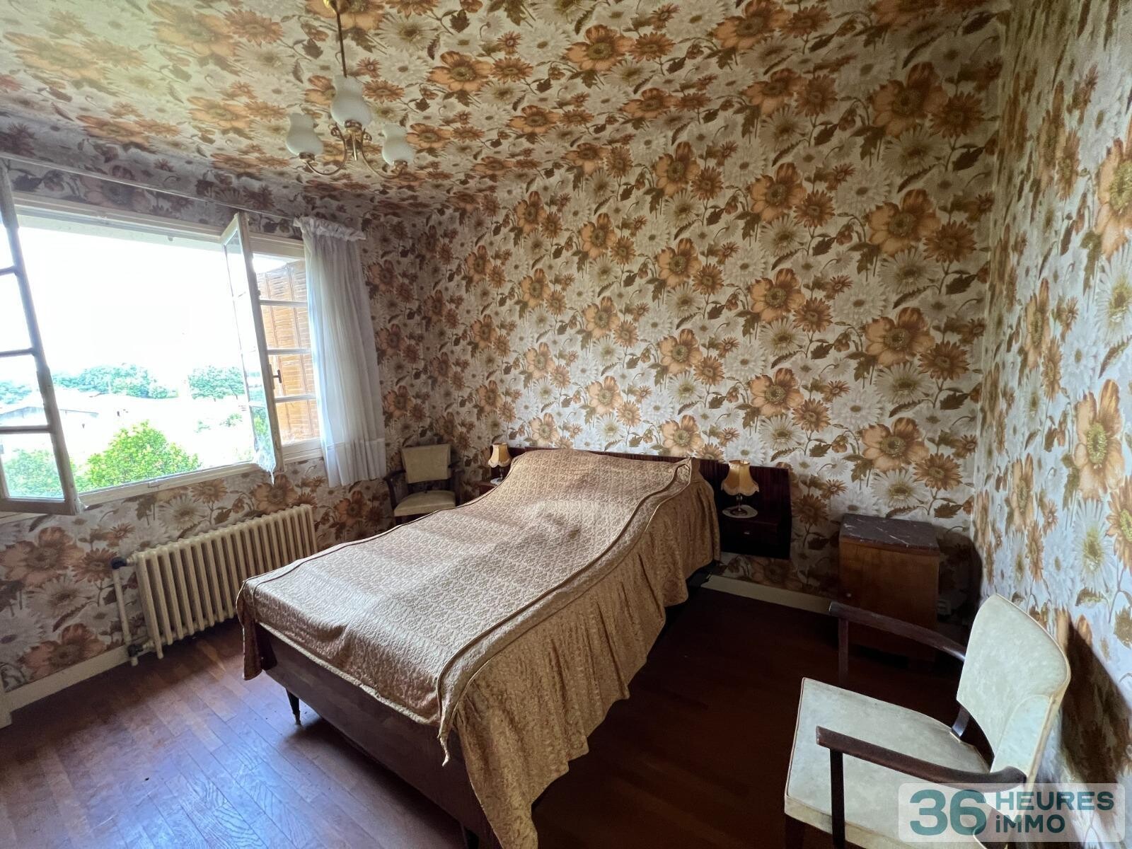 Ensemble de deux maisons sur un grand terrain arbore