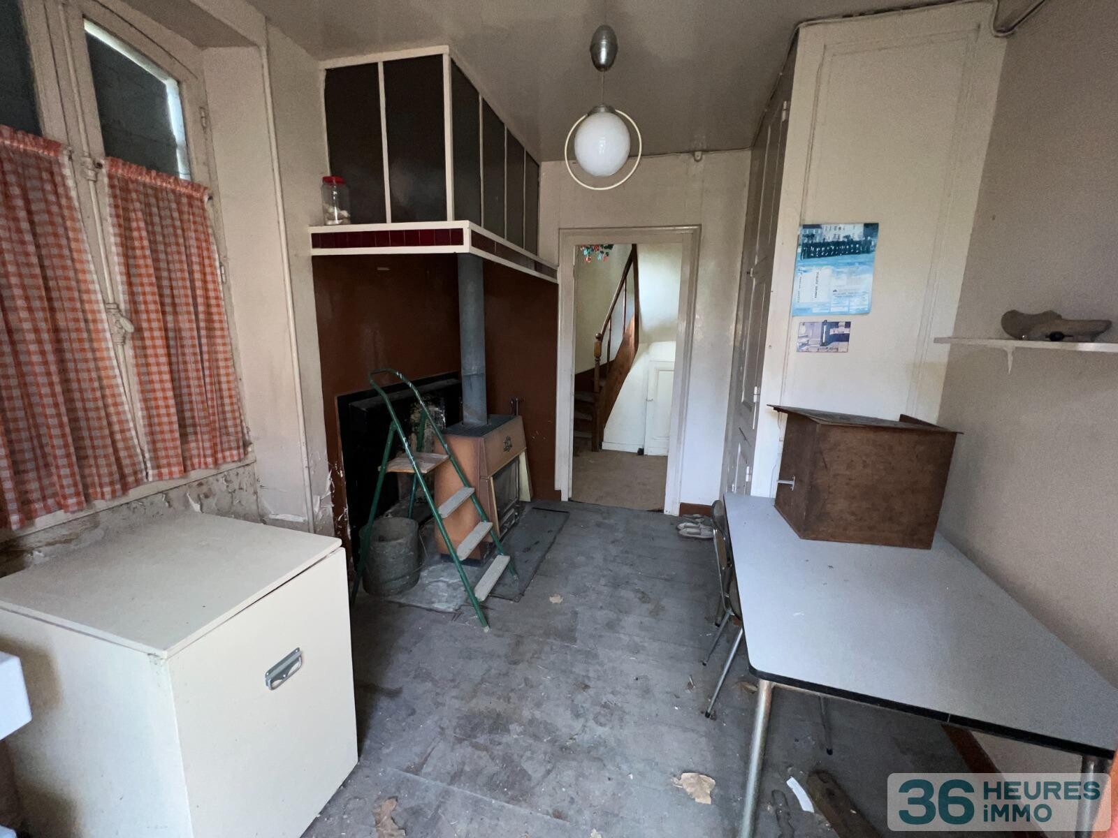 Ensemble de deux maisons sur un grand terrain arbore