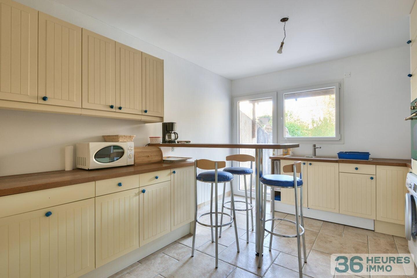 Maison avec jardin ensoleillé