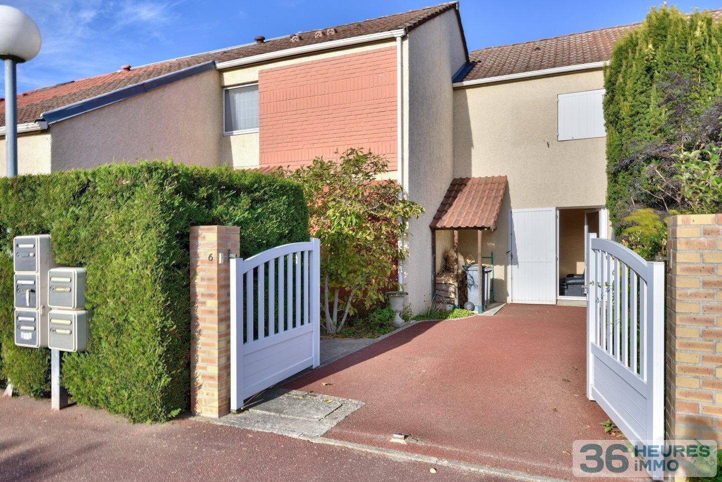 Maison avec jardin ensoleillé