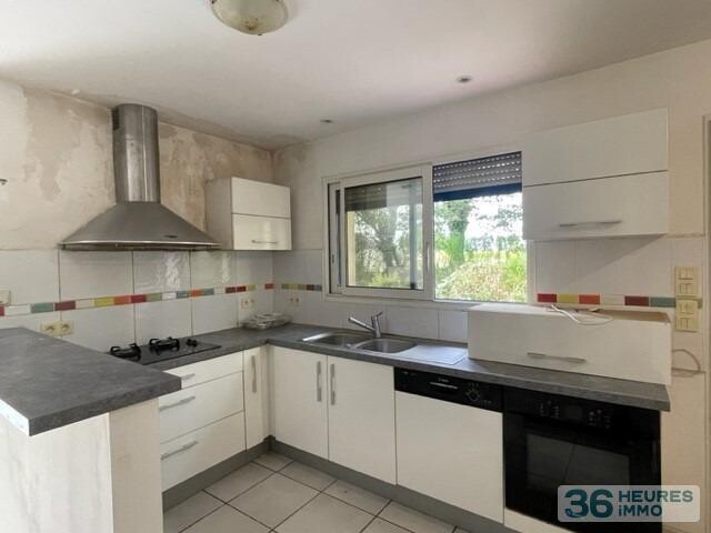 Maison en campagne de riec sur belon avec 7.302 m² de terrain