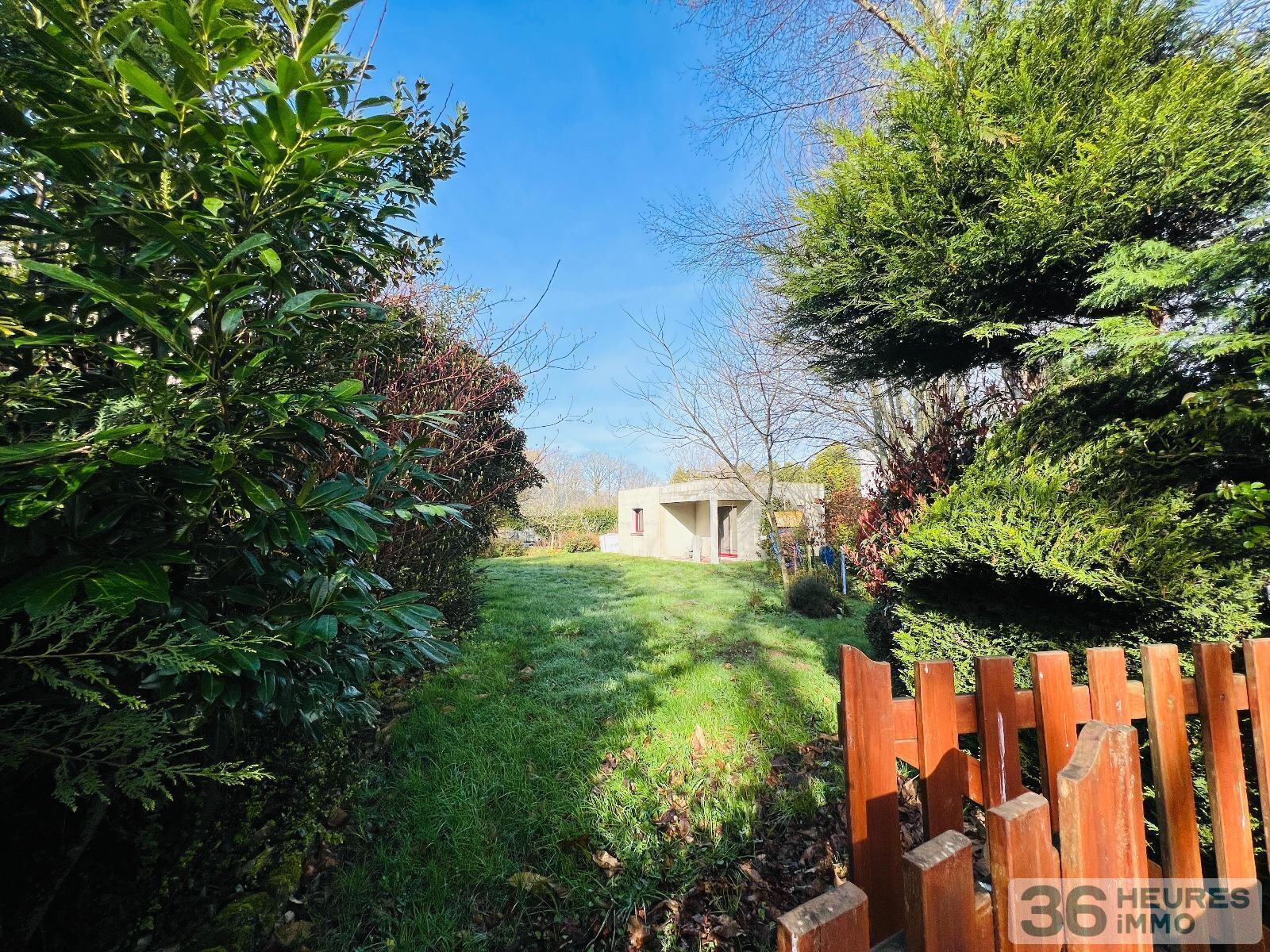 Logement type 2 sur jardin arboré