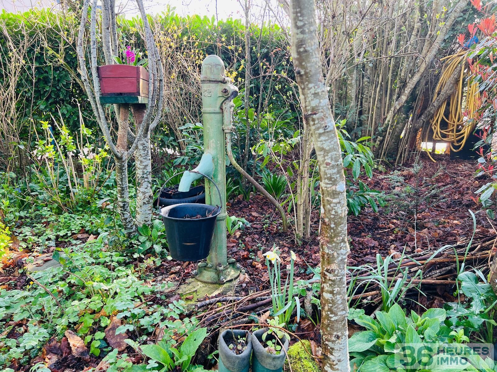 Logement type 2 sur jardin arboré