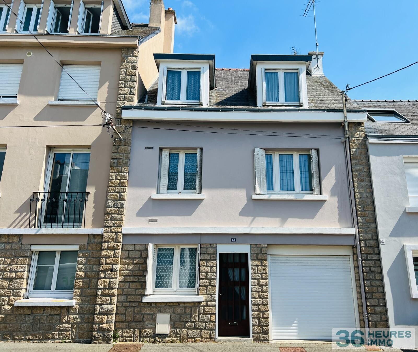 Maison familiale avec jardin et garage