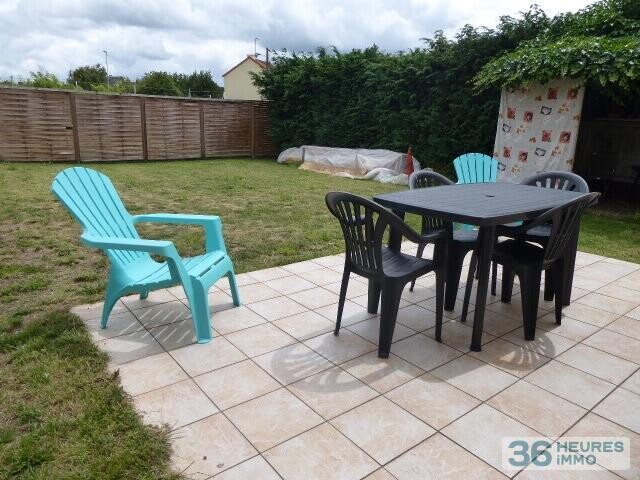 Terrain a bâtir avec petite maison