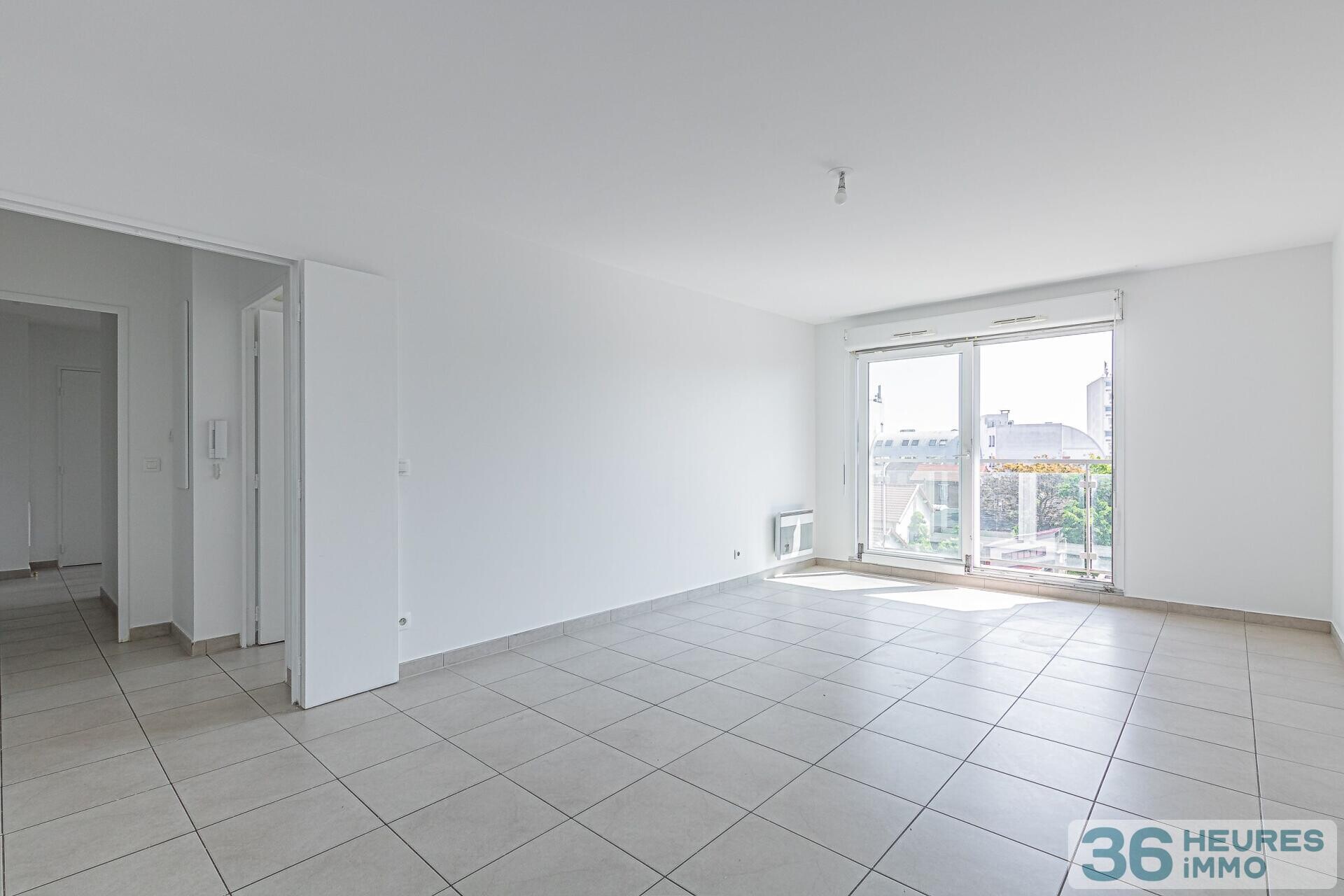 Trois pieces 65 m2 balcon ascenseur parking cave