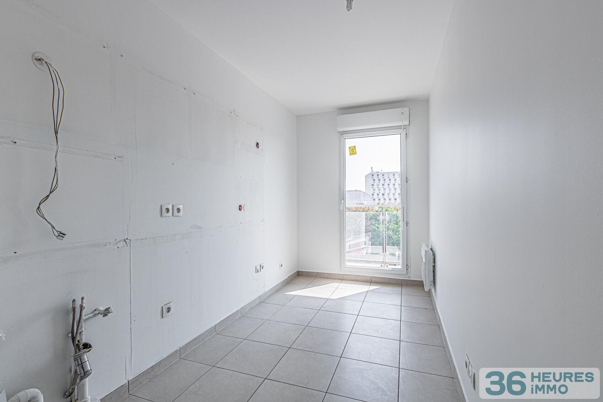 Trois pieces 65 m2 balcon ascenseur parking cave