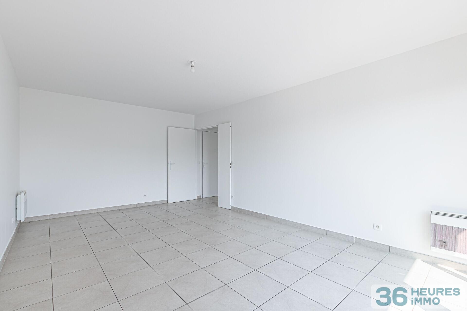 Trois pieces 65 m2 balcon ascenseur parking cave