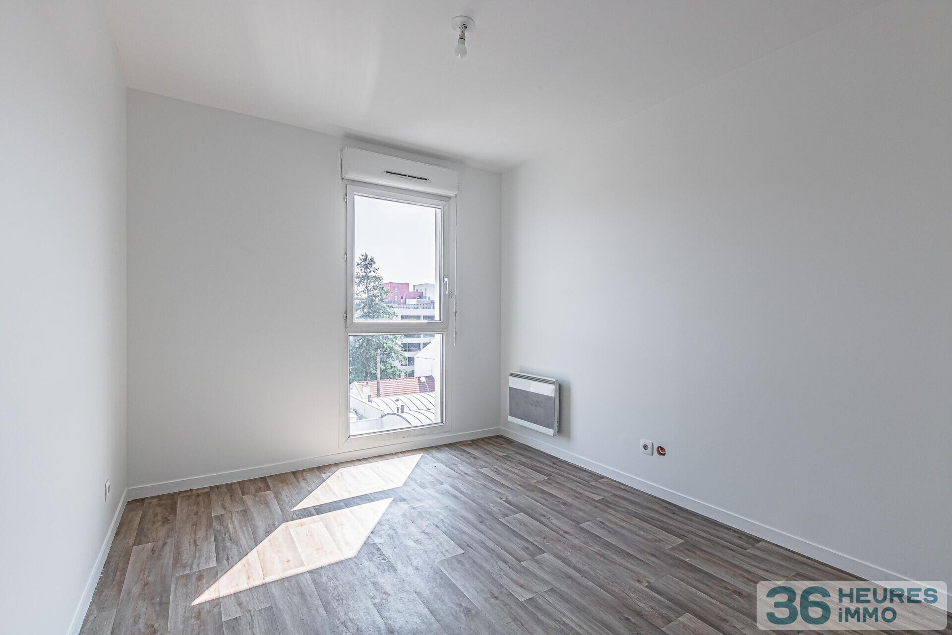 Trois pieces 65 m2 balcon ascenseur parking cave