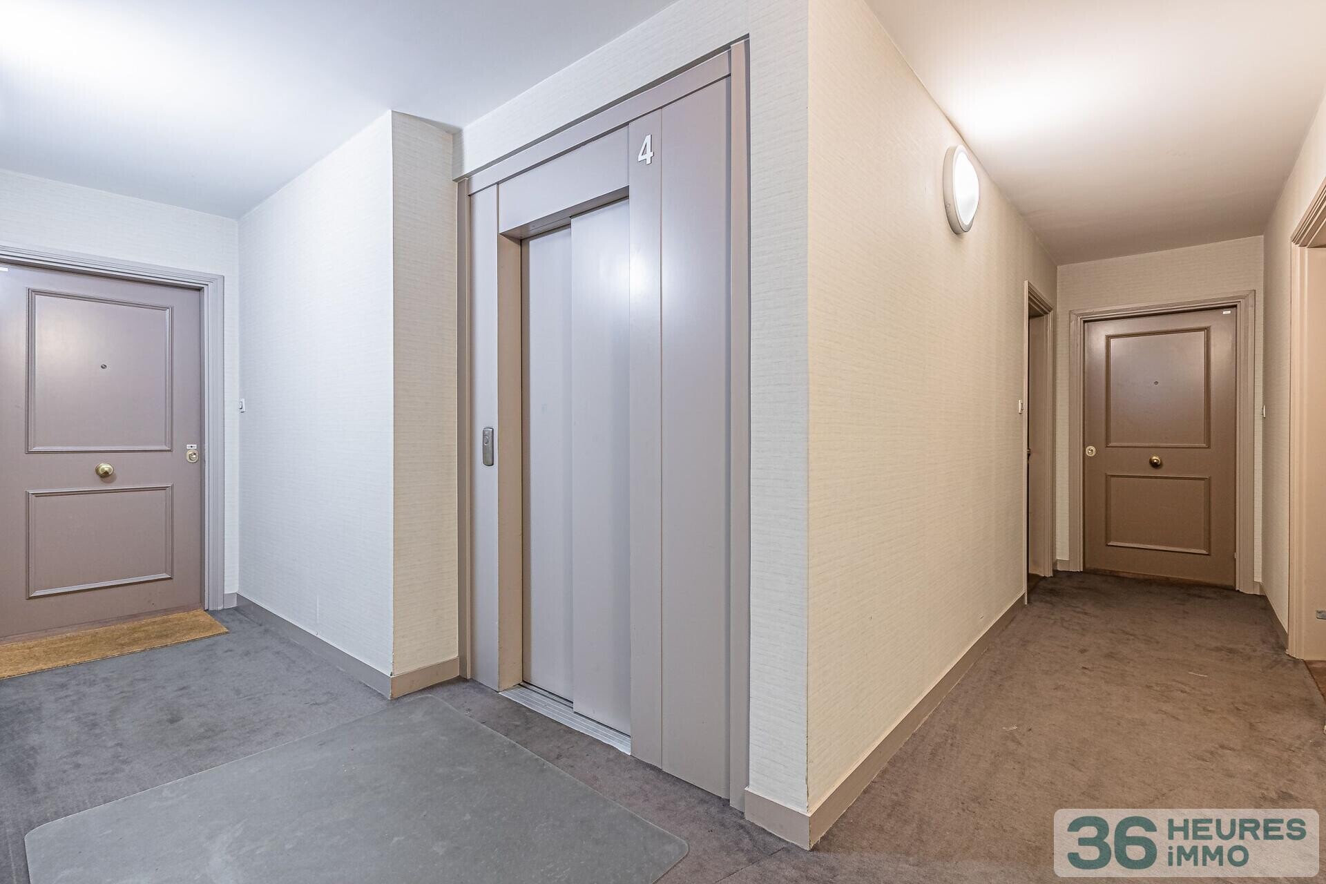 Trois pieces 65 m2 balcon ascenseur parking cave