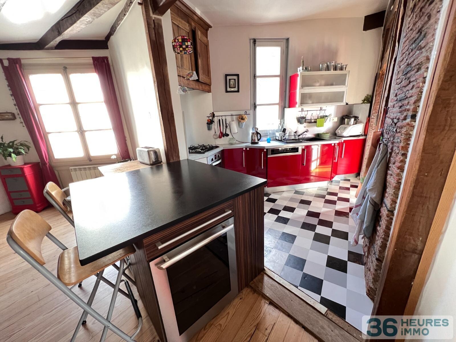 Bel appartement ancien au coeur de ville