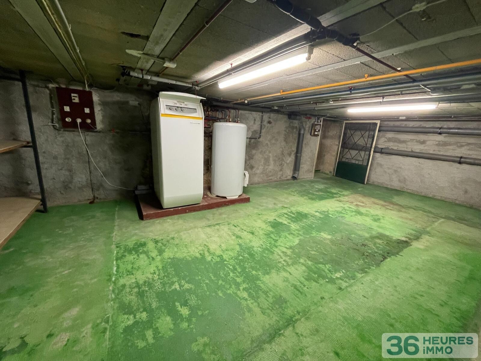 Maison de ville en très bon état général - jardin et double garage