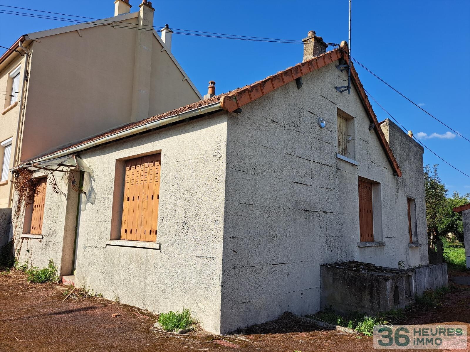 Rue de la fraternite - maison a renover - plain pied - avec garage et jardin 