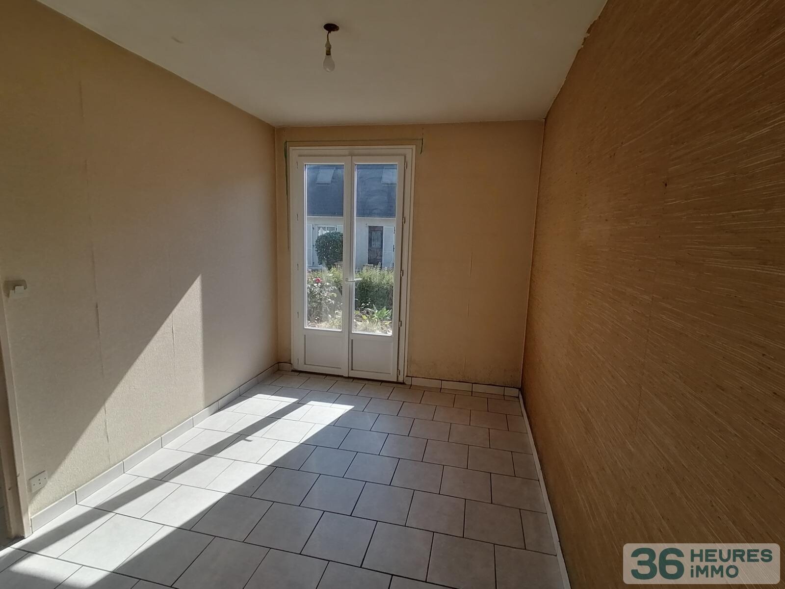 Maison trois chambres en centre-ville