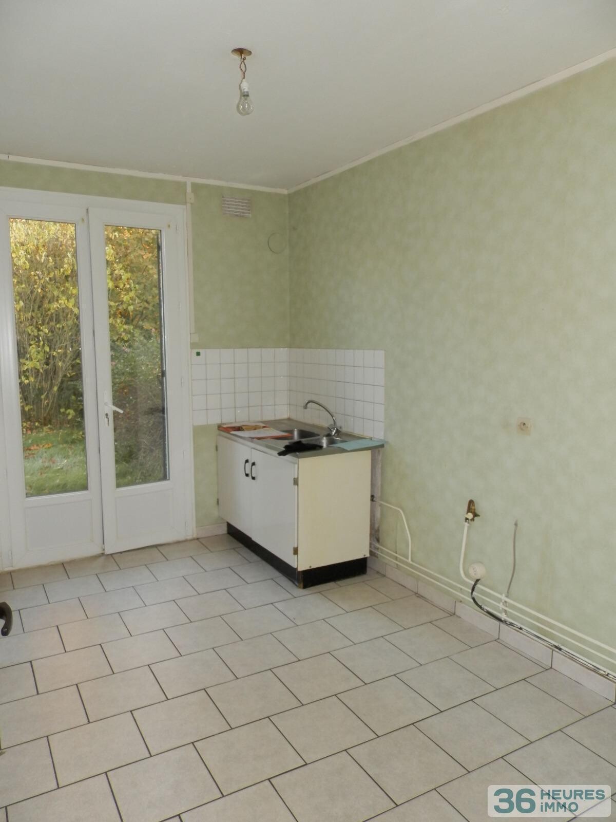 Maison trois chambres en centre-ville