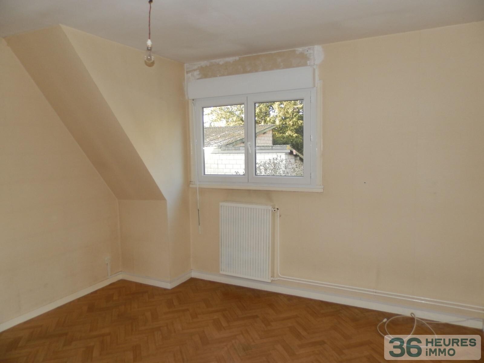 Maison trois chambres en centre-ville