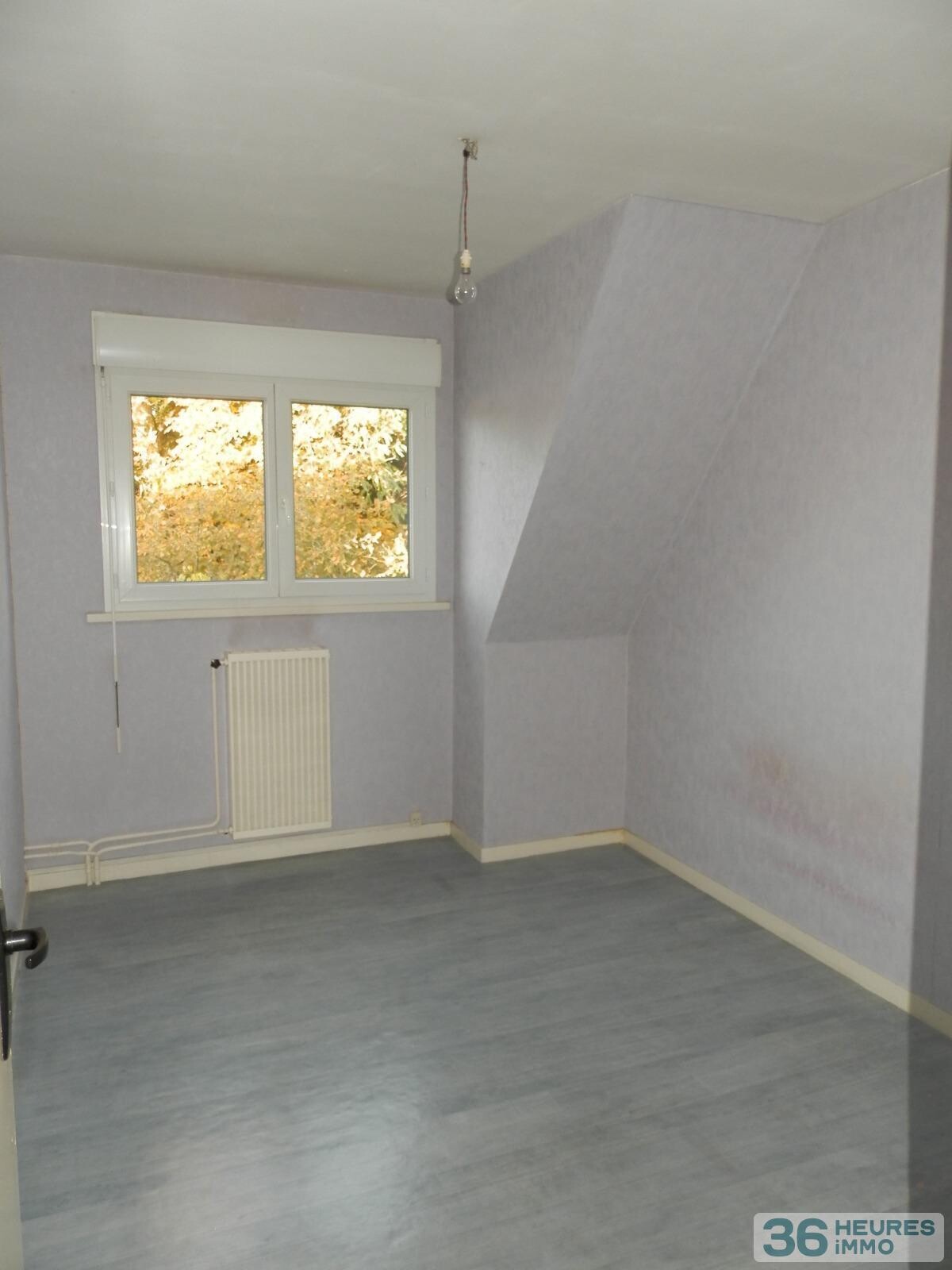 Maison trois chambres en centre-ville