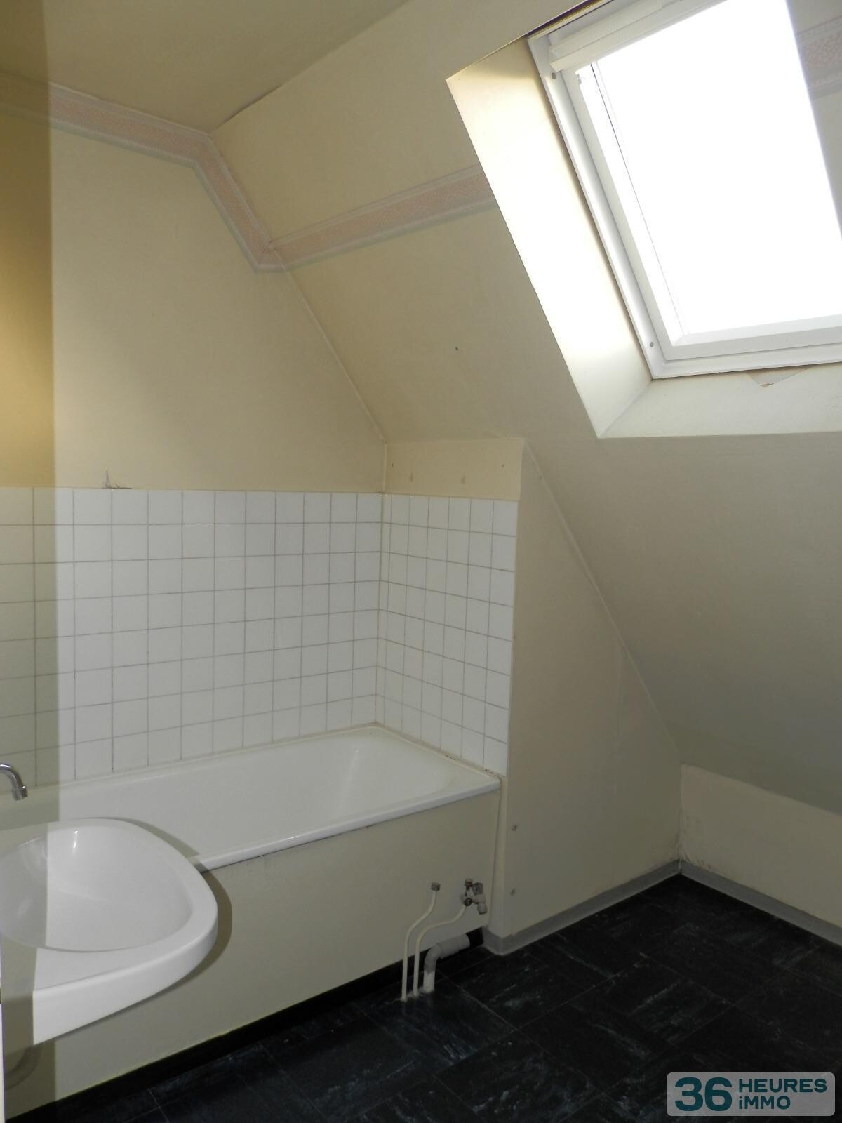 Maison trois chambres en centre-ville