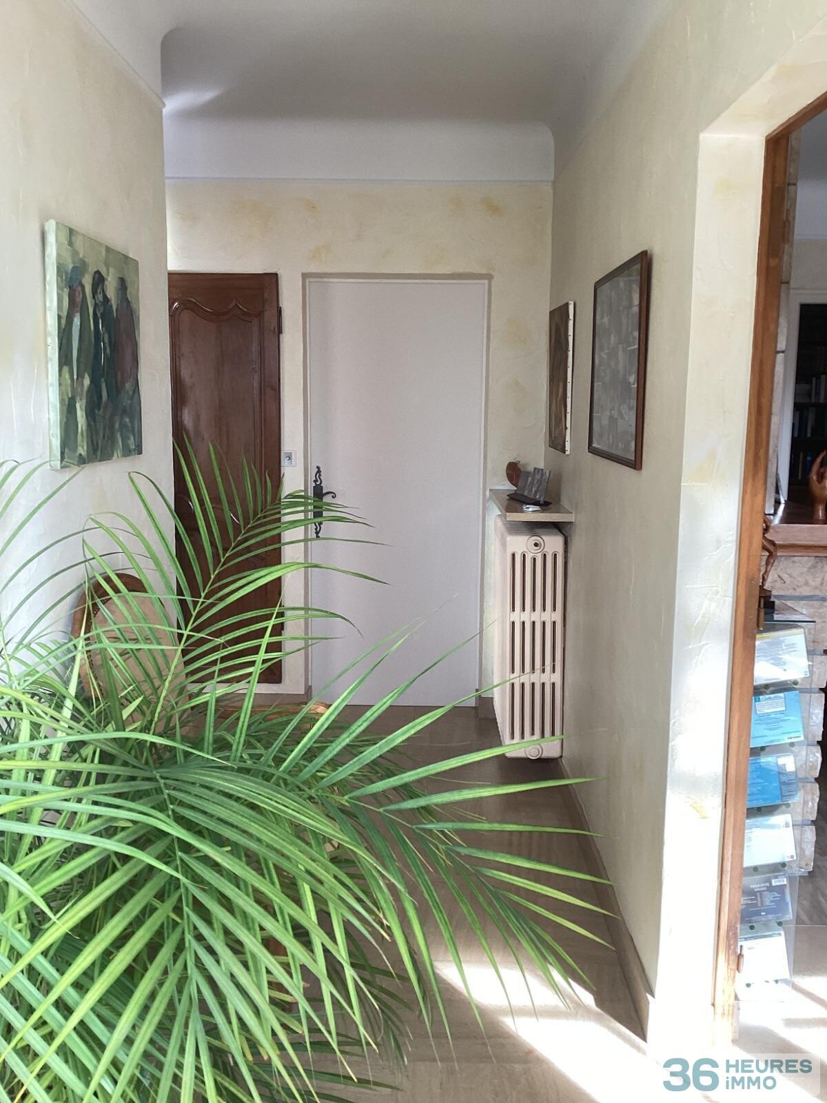 Pavillon style ile de france sur sous-sol avec partie de terrain constructible