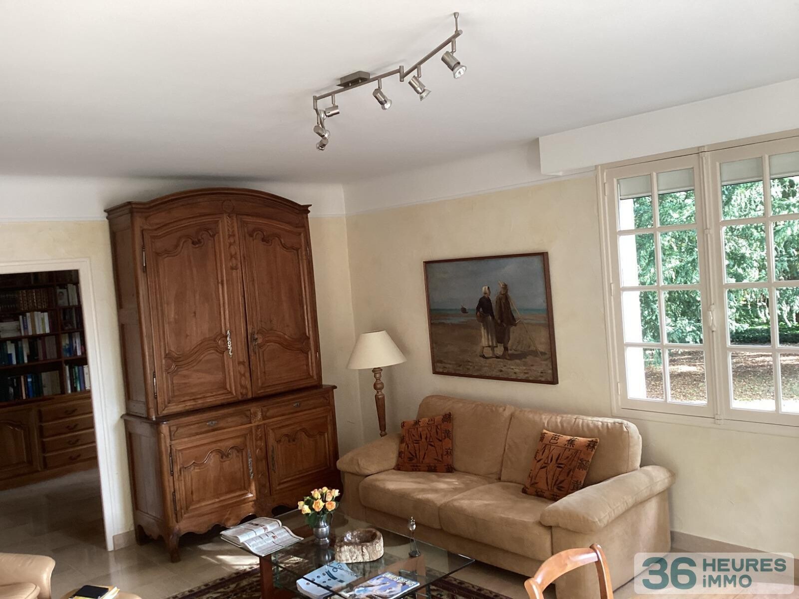 Pavillon style ile de france sur sous-sol avec partie de terrain constructible