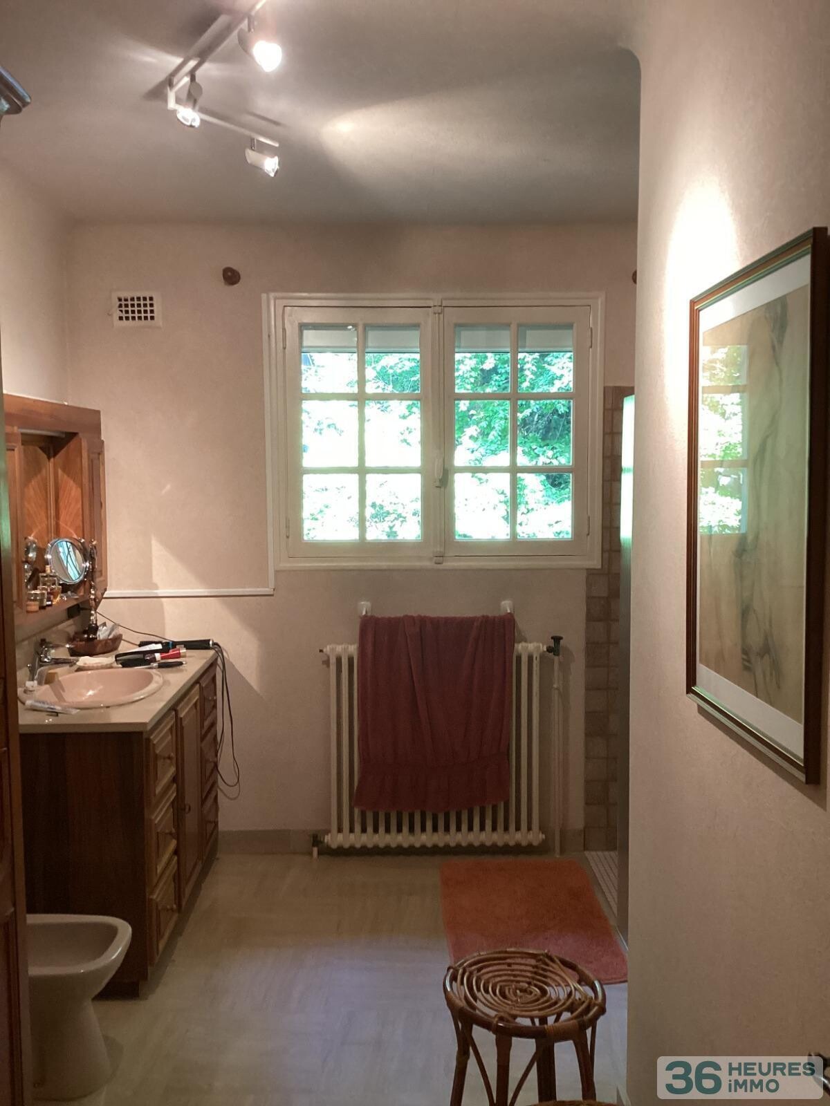 Pavillon style ile de france sur sous-sol avec partie de terrain constructible