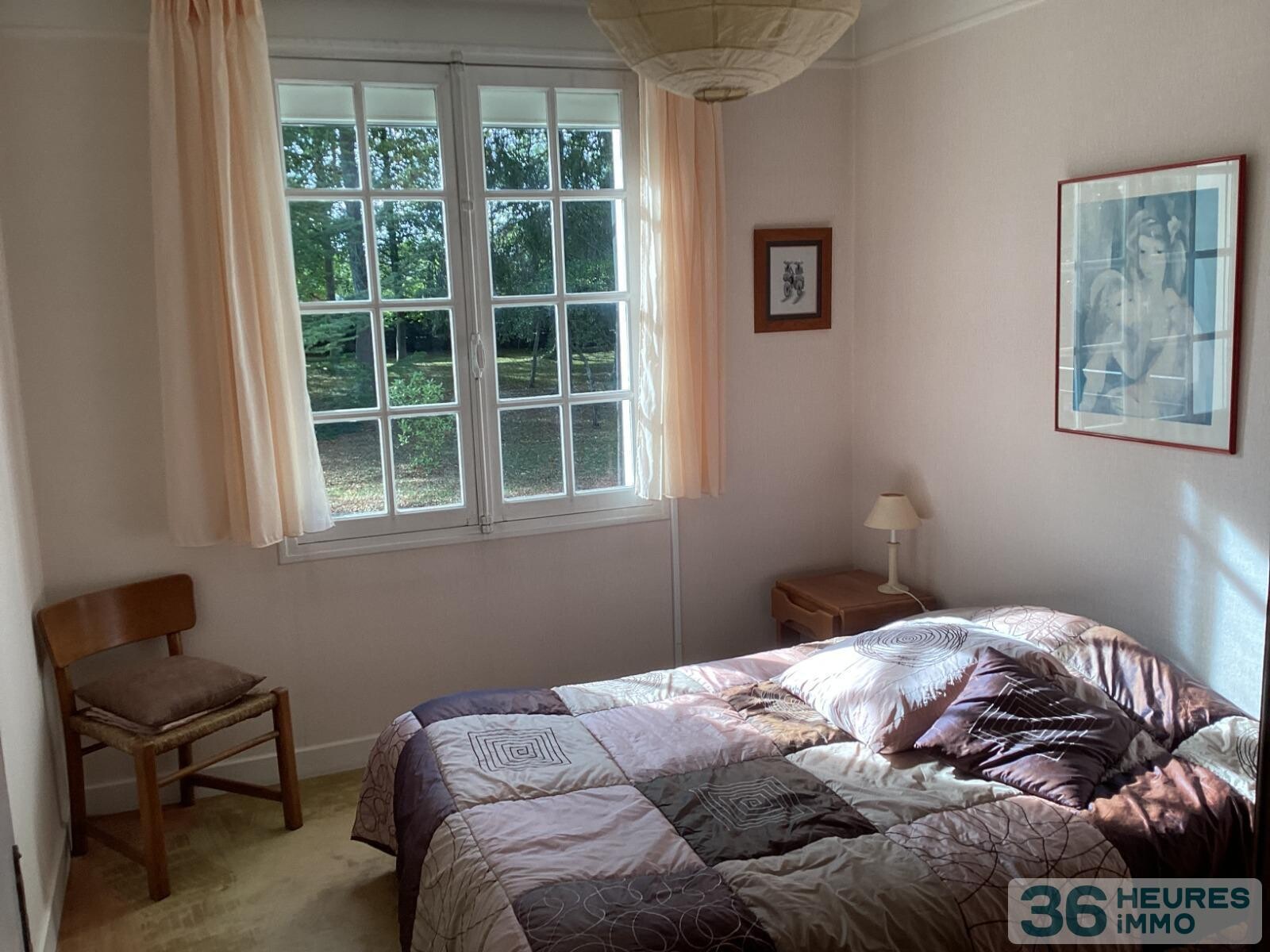 Pavillon style ile de france sur sous-sol avec partie de terrain constructible