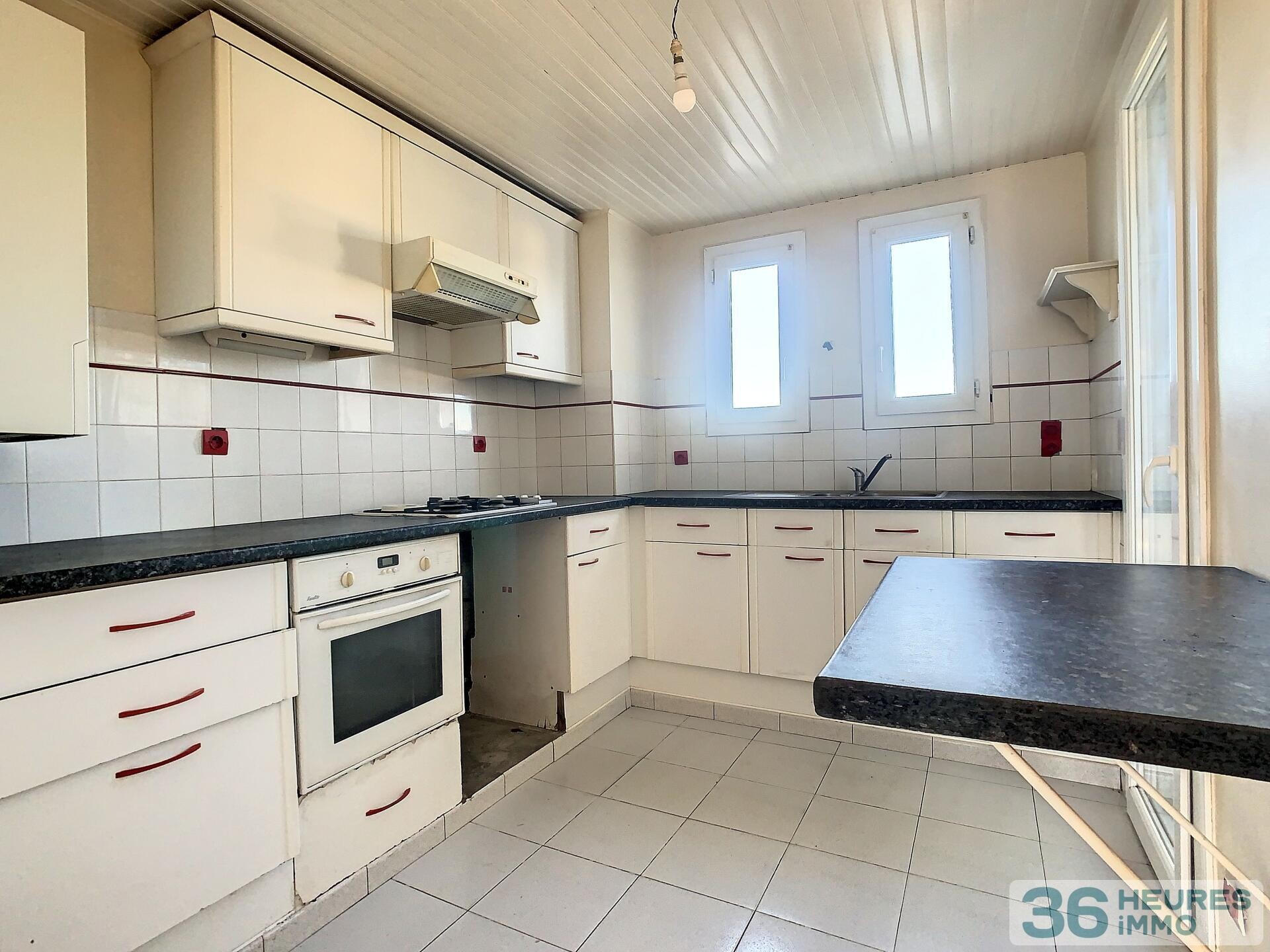 Appartement type 3 à rénover et garage