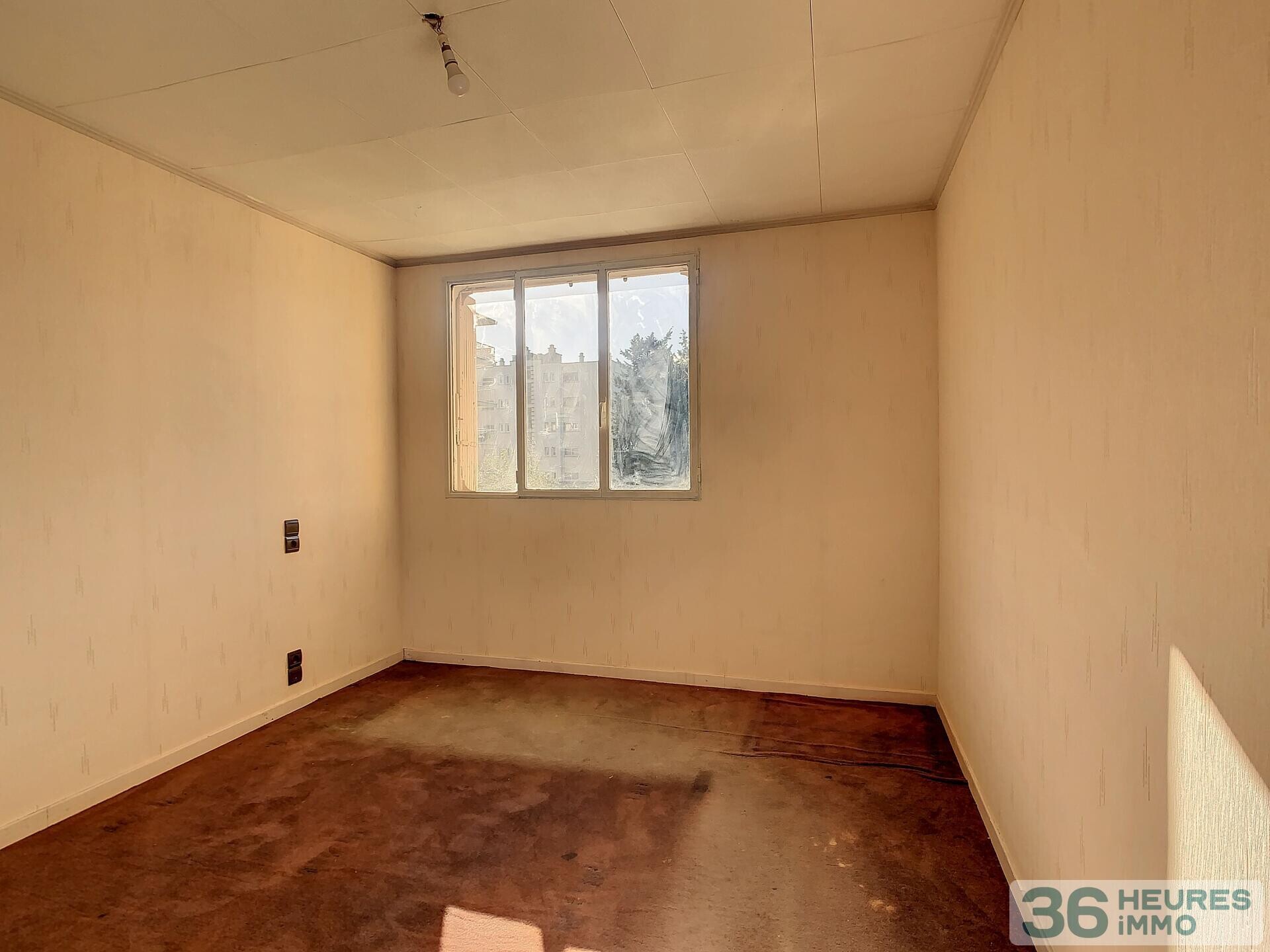 Appartement type 3 à rénover et garage