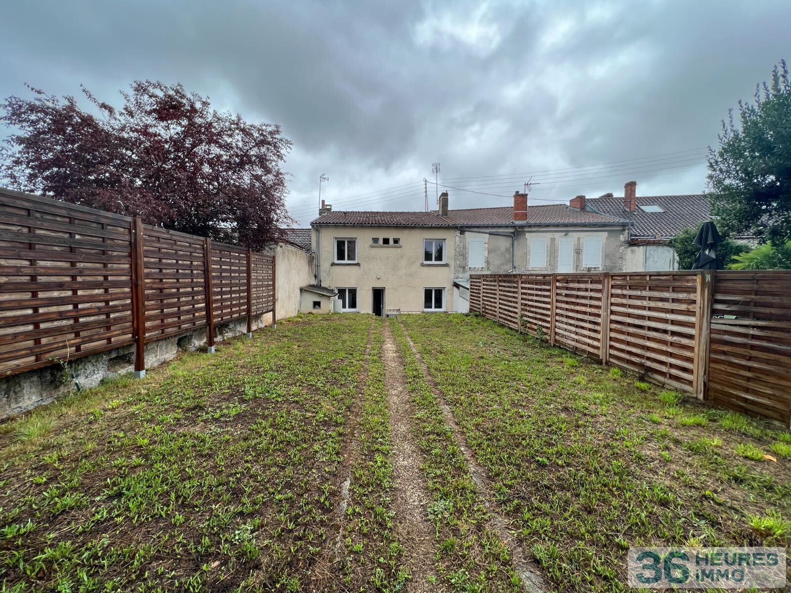 MAISON AVEC JARDIN ET GARAGE