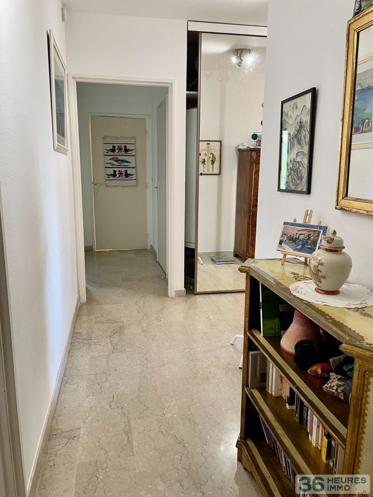 APPARTEMENT 4 PIÈCES AVEC TERRASSE + 2 LOGGIAS FERMÉES + GARAGE + 2 CAVES.