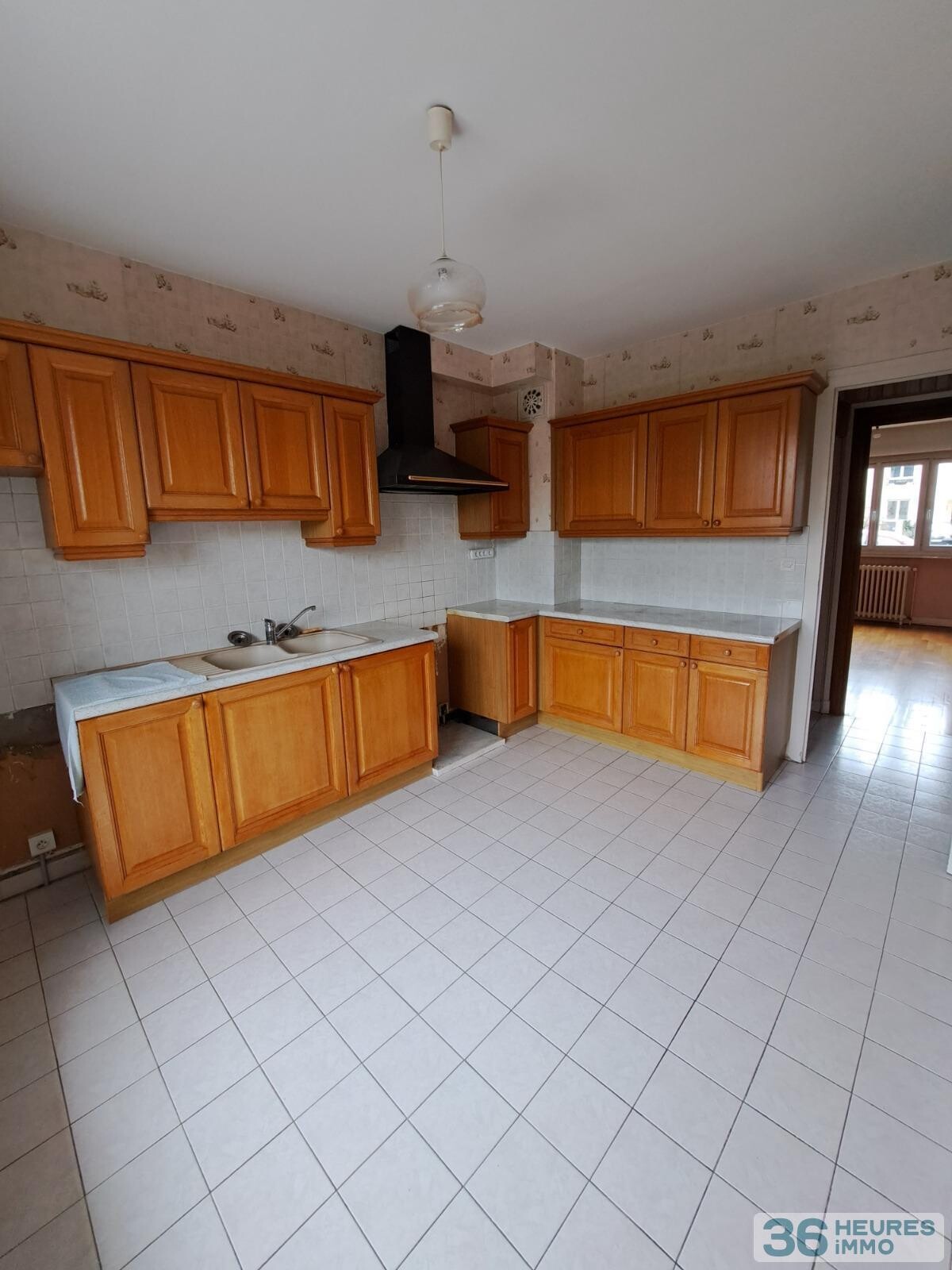 APPARTEMENT AVEC GARAGE ET JARDIN 