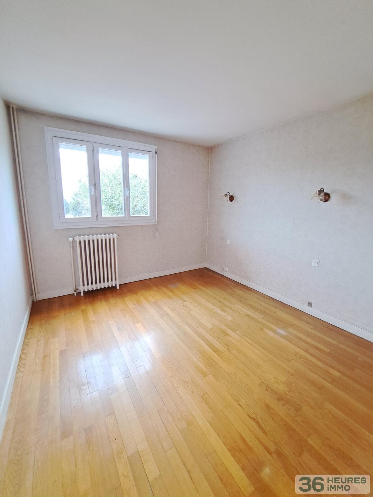 APPARTEMENT AVEC GARAGE ET JARDIN 