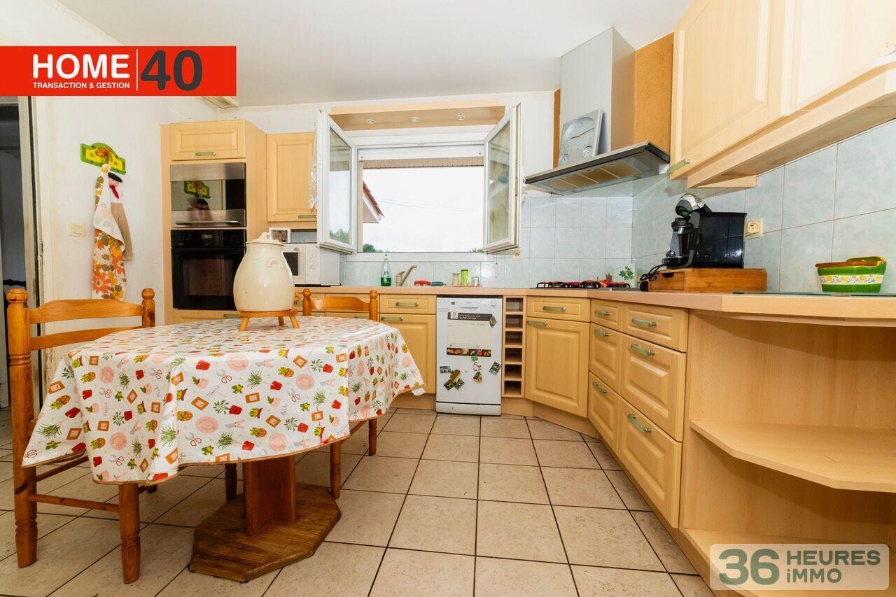 Maison 3 chambres + 2 garages 