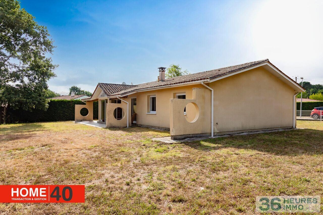 Maison 3 chambres + 2 garages 