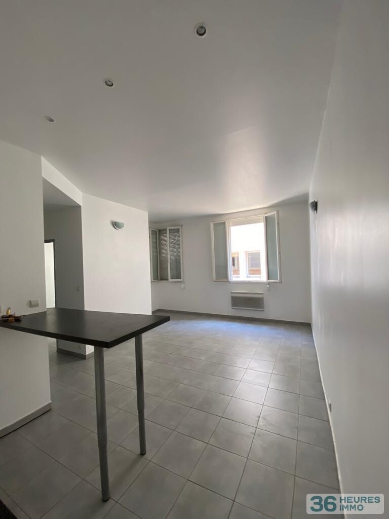 Immeuble 210 m² - 4 appartements + Local commercial + Cave - Centre ville -