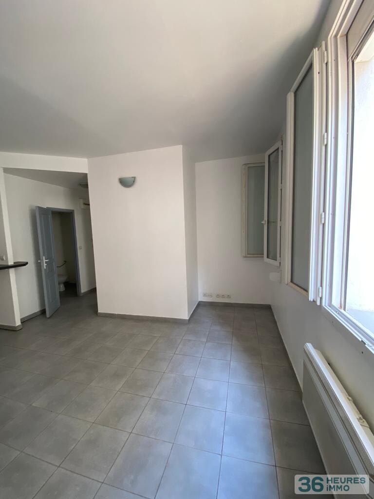 Immeuble 210 m² - 4 appartements + Local commercial + Cave - Centre ville -