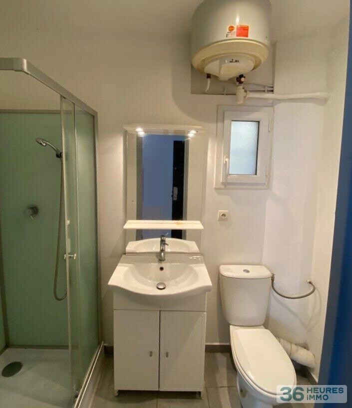 Immeuble 210 m² - 4 appartements + Local commercial + Cave - Centre ville -