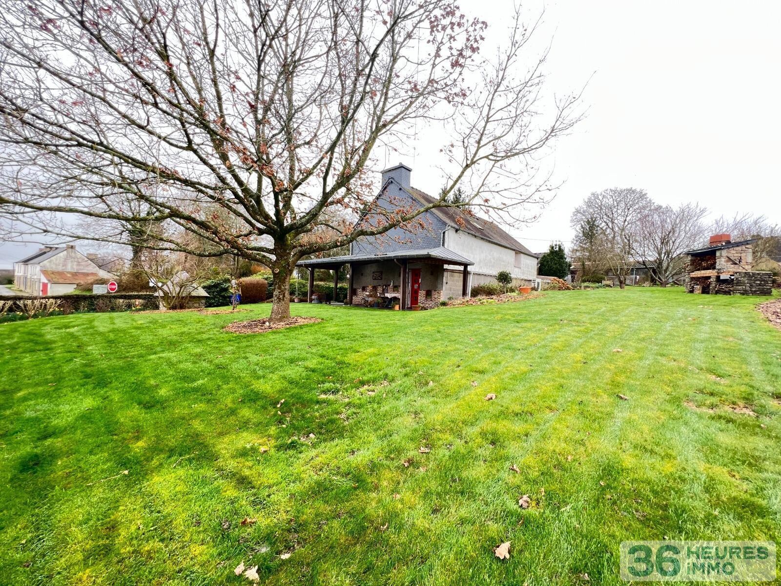 Ensemble immobilier avec maison et hangars