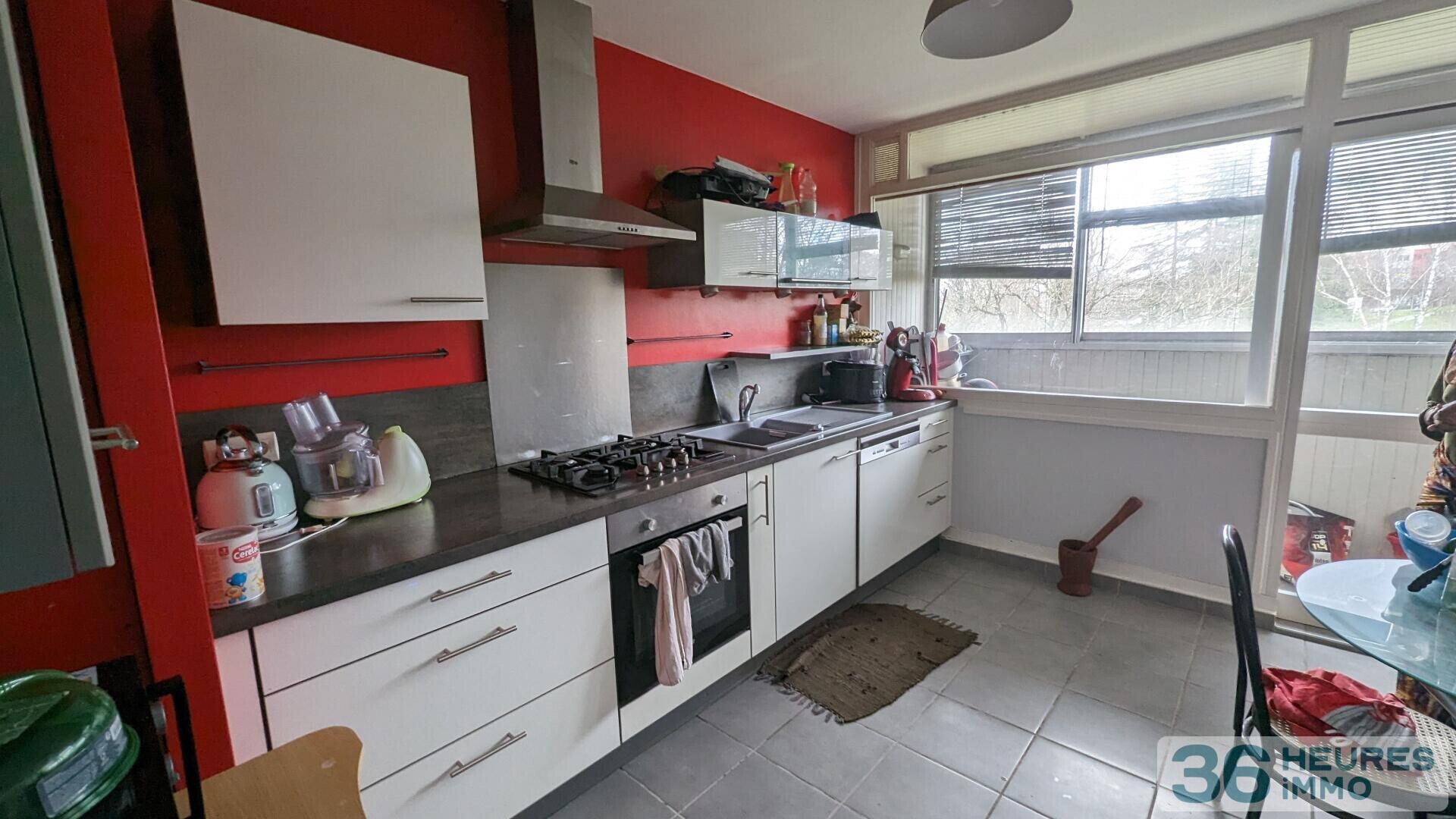 Appartement de pratiquement 90m² avec balcon, buanderie et cave