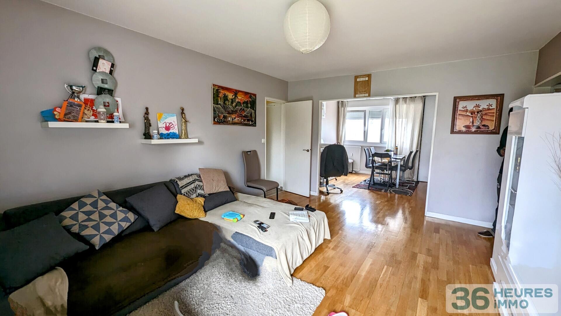 Appartement de pratiquement 90m² avec balcon, buanderie et cave