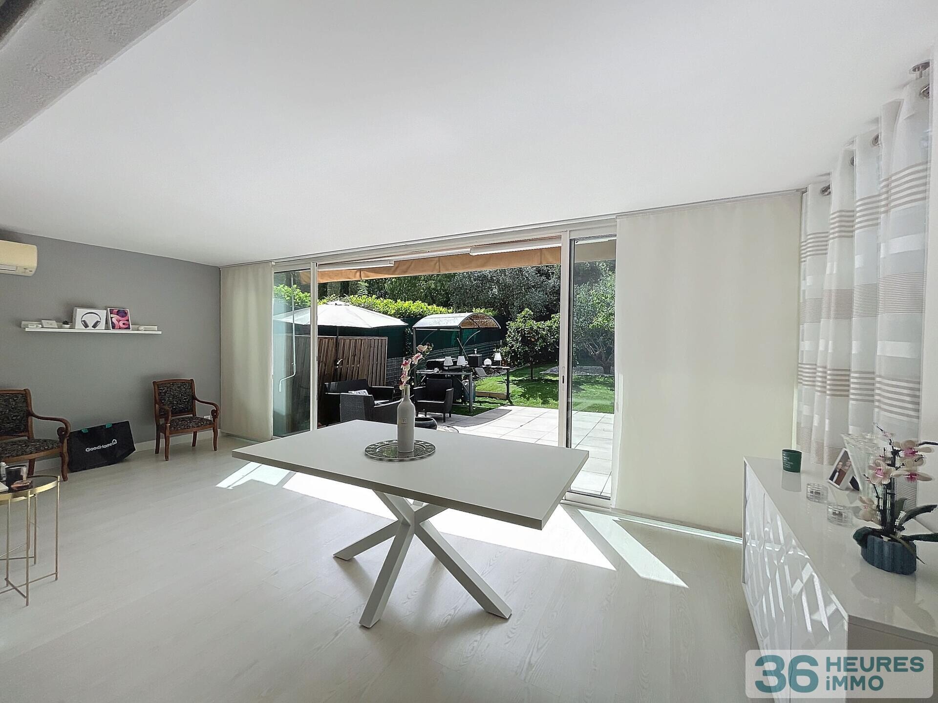 Appartement T3 avec jardin, parking et garage 