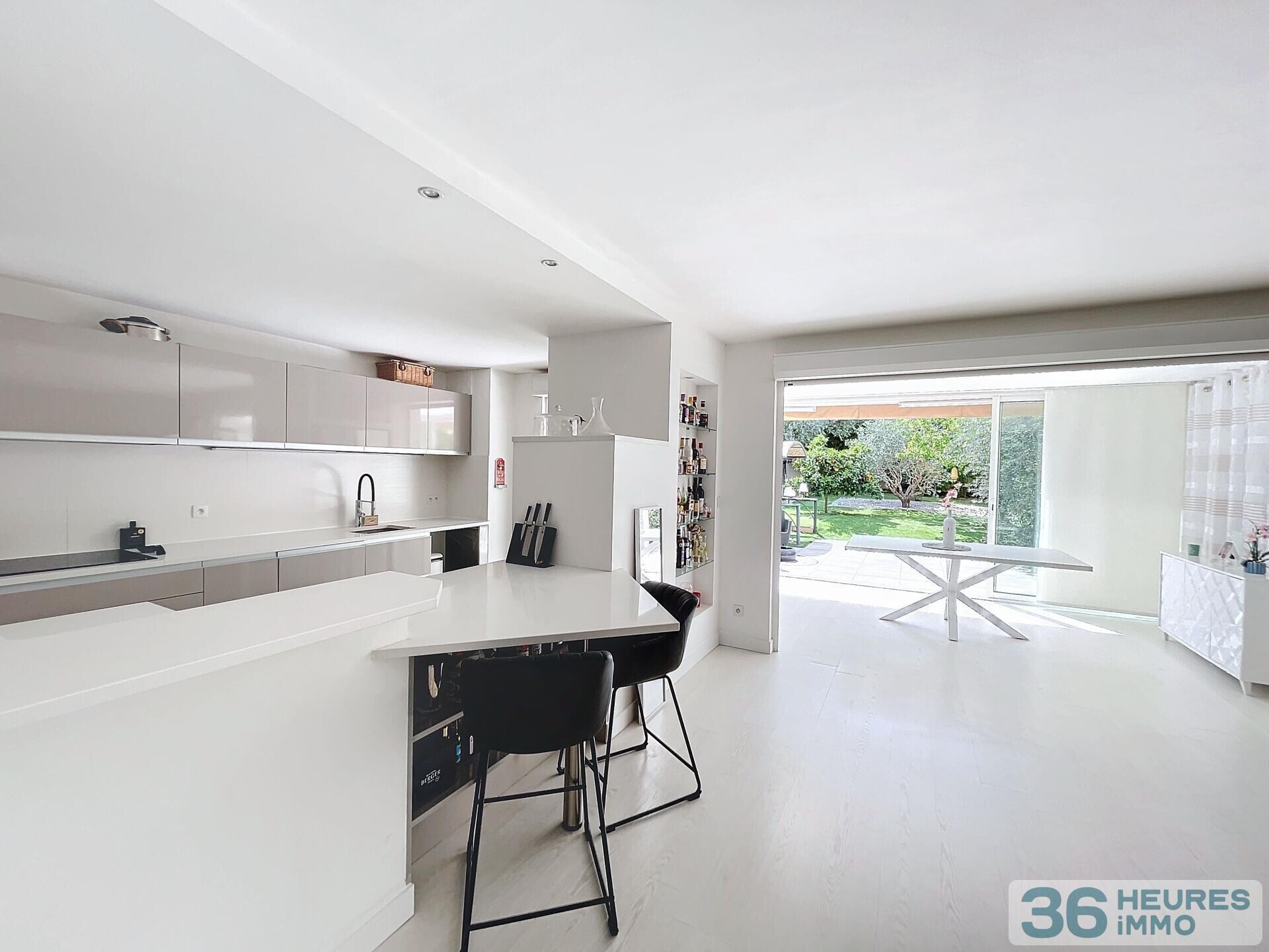 Appartement T3 avec jardin, parking et garage 