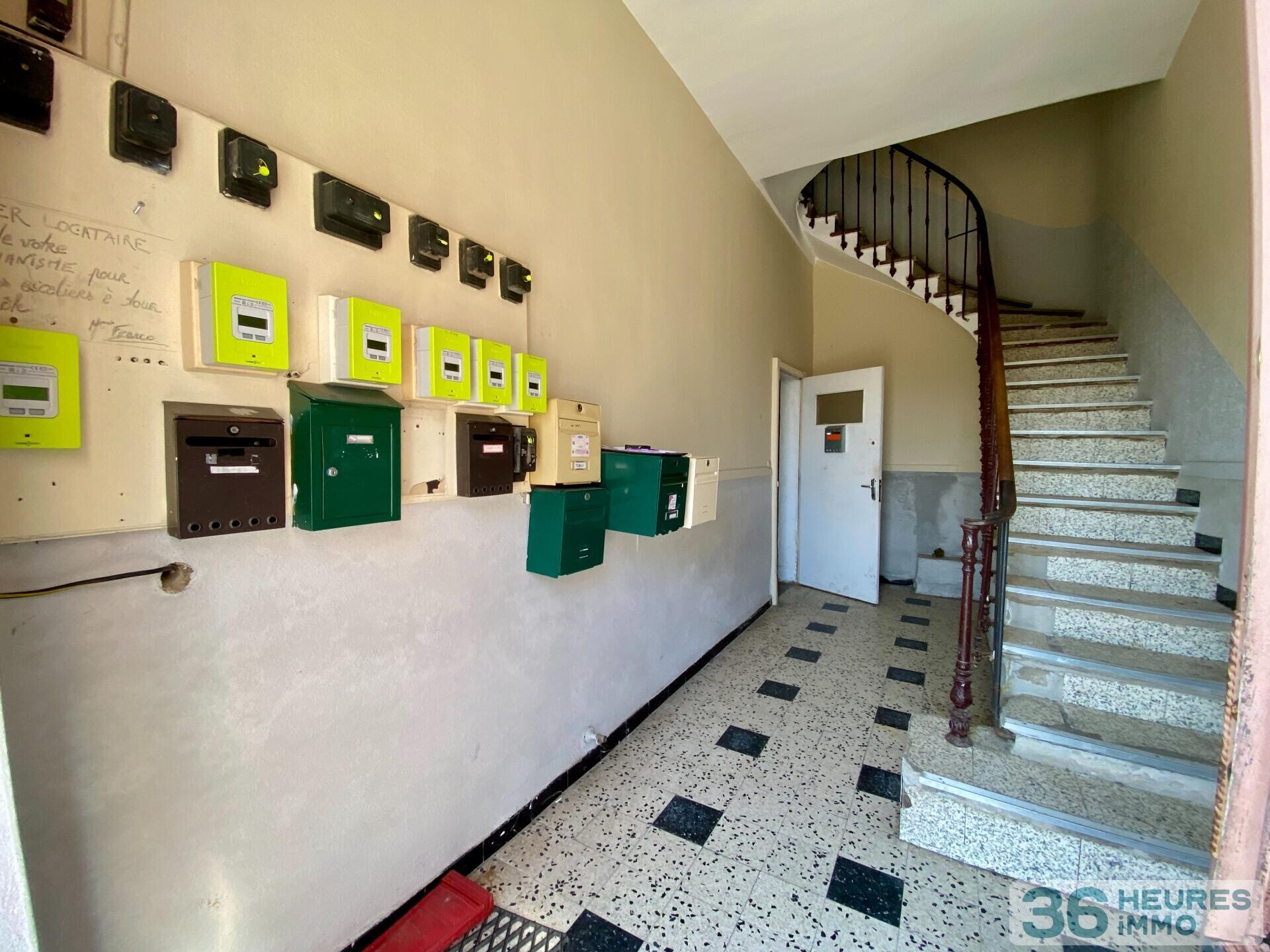 Immeuble à rénover 5 apt + terrain constructible