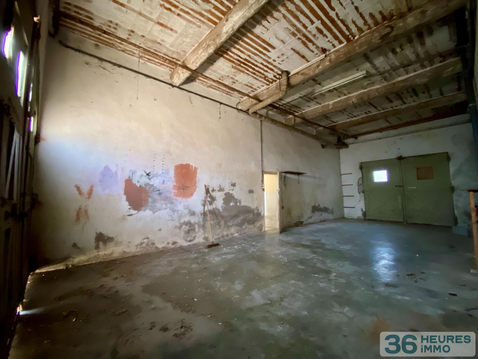 Immeuble à rénover 5 apt + terrain constructible