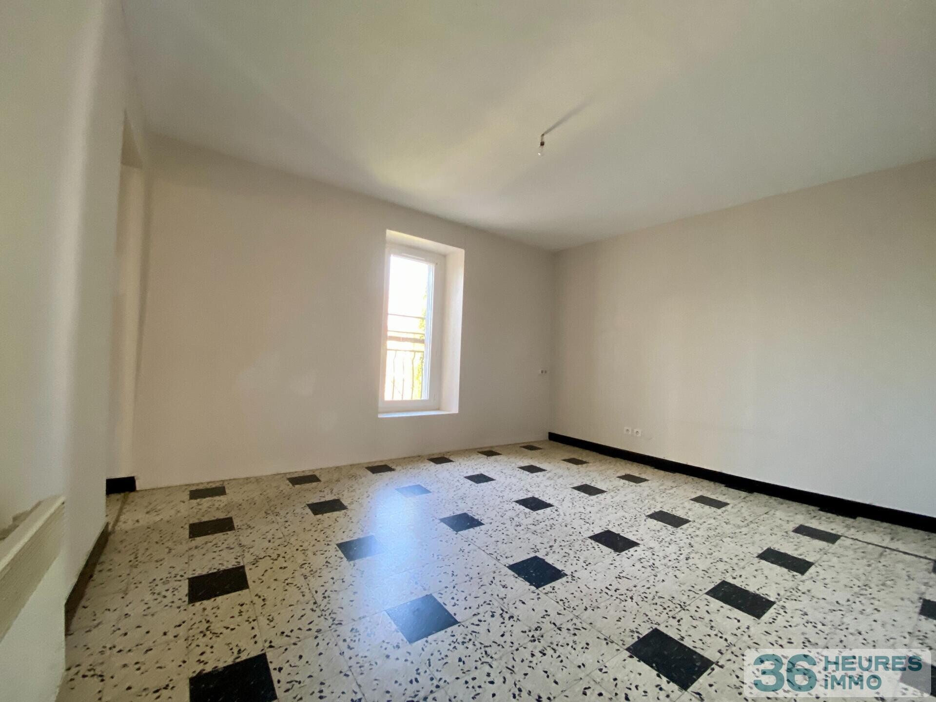 Immeuble à rénover 5 apt + terrain constructible