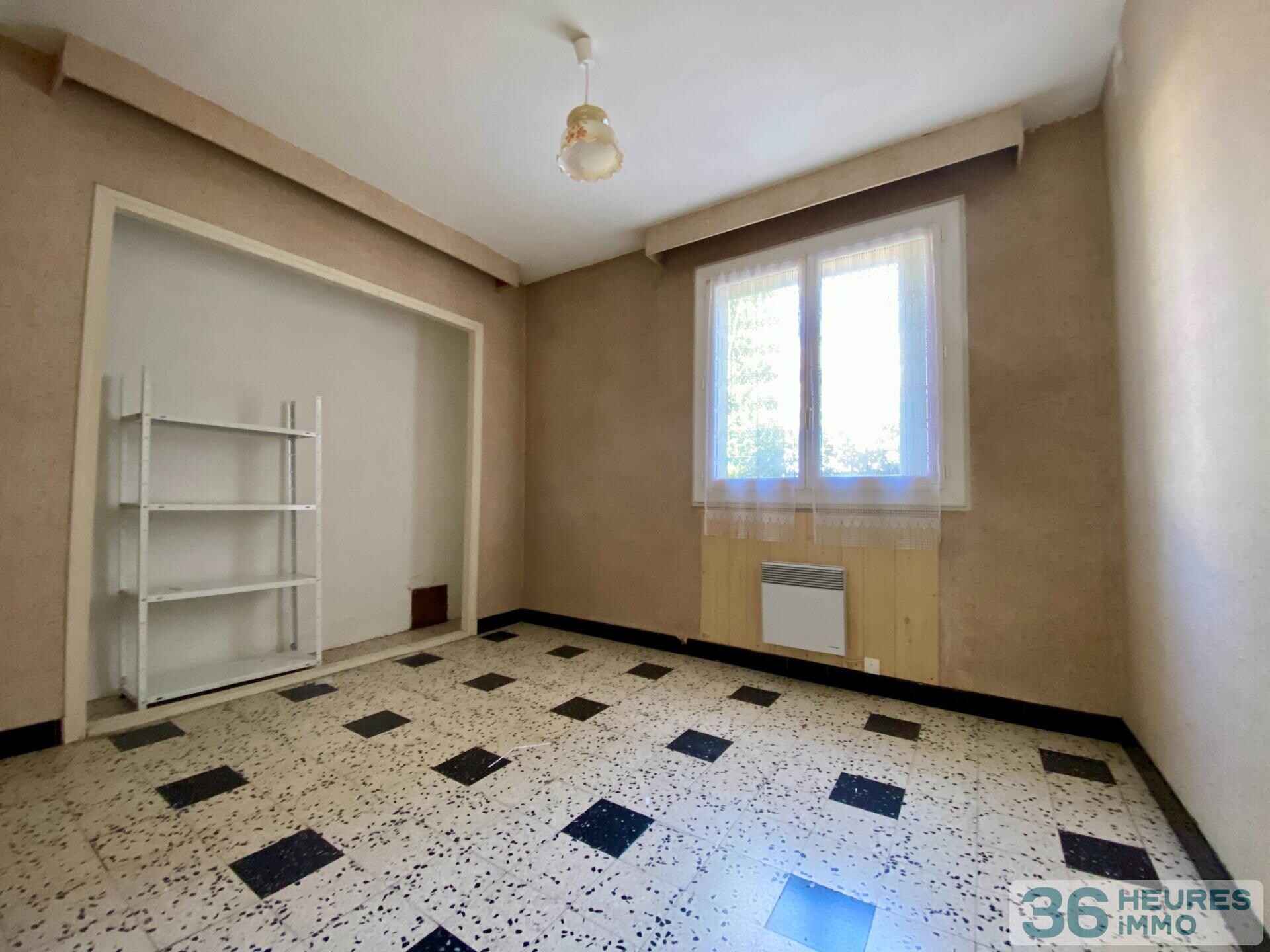 Immeuble à rénover 5 apt + terrain constructible