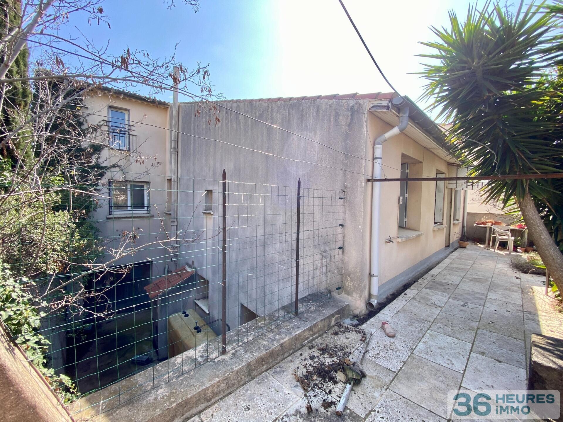 Immeuble à rénover 5 apt + terrain constructible